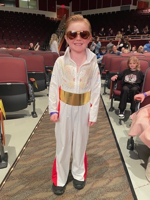 1st grader posing as Elvis