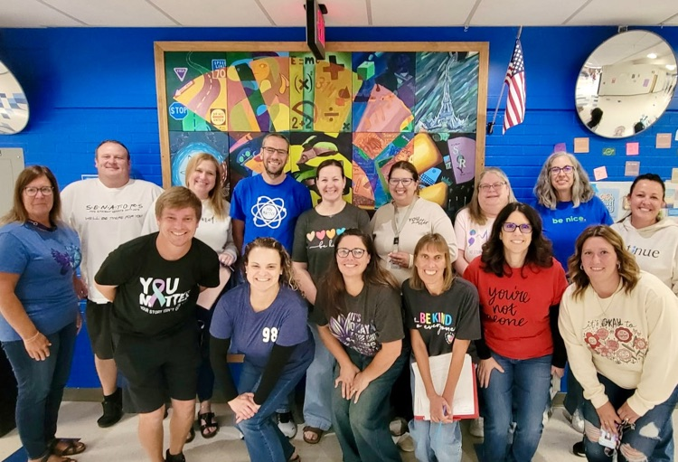 picture of high school staff wearing shirts to promote world suicide prevention  day