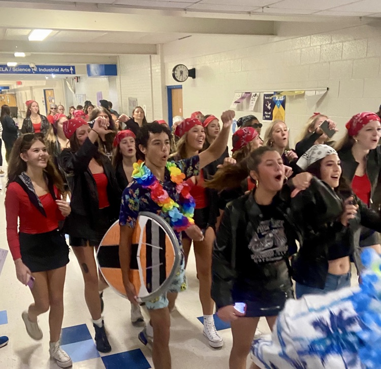 picture of students having a parade in halls of phs 