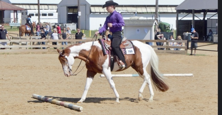 picture of phs student riding a horse 