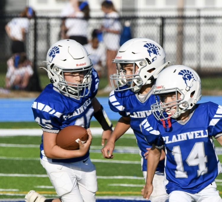 picture of three rocket football players