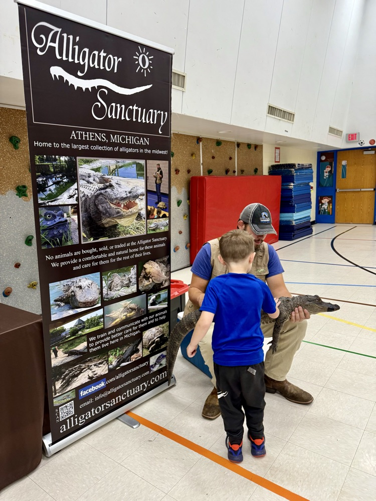 picture of student during a presentation from the alligator sanctuary