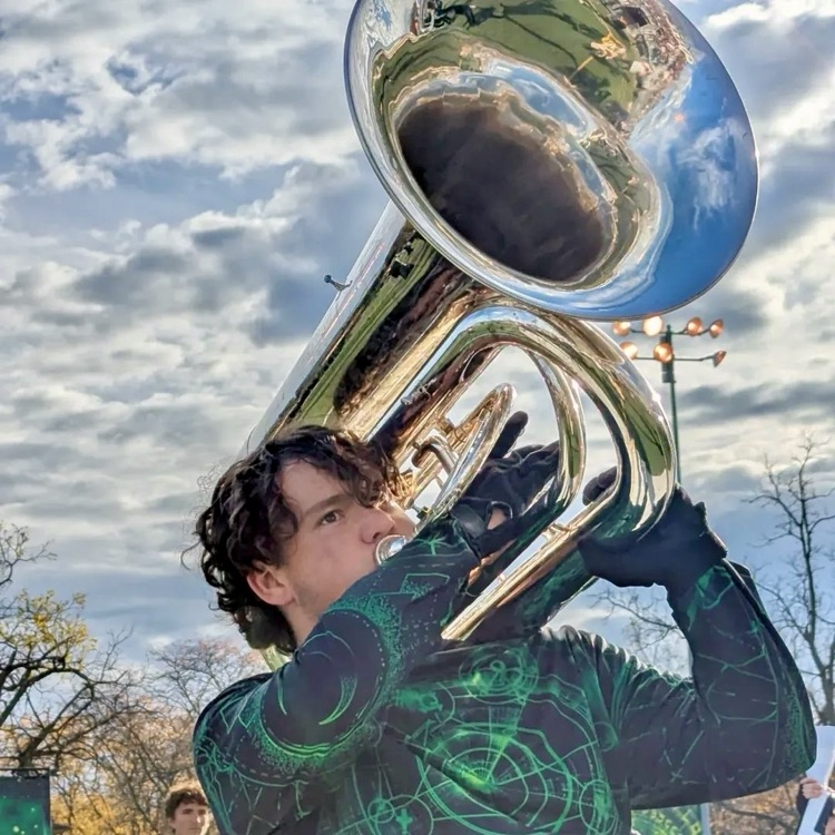 picture of marching band student playing during a competition