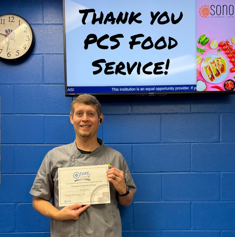 picture of pcs food service director holding a certificate