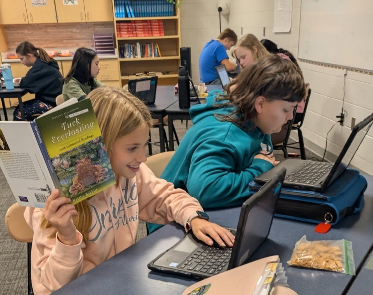 picture of two students working in a classroom