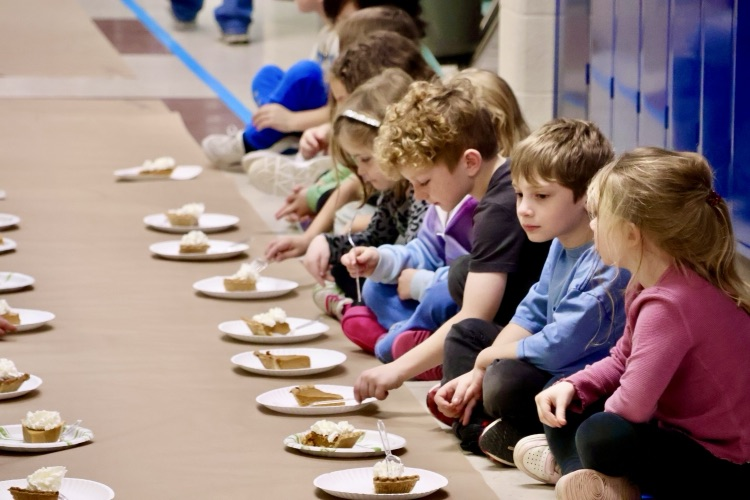 picture of students enjoying pie day at cooper before Thanksgiving break 