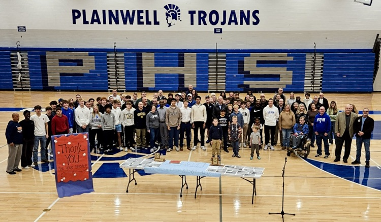 picture of alumni and current basketball teams with their coaches and families