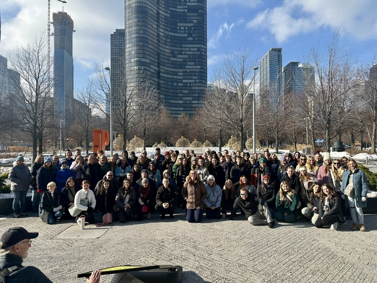 group picture of 8th grade band and choir on trip to Chicago 