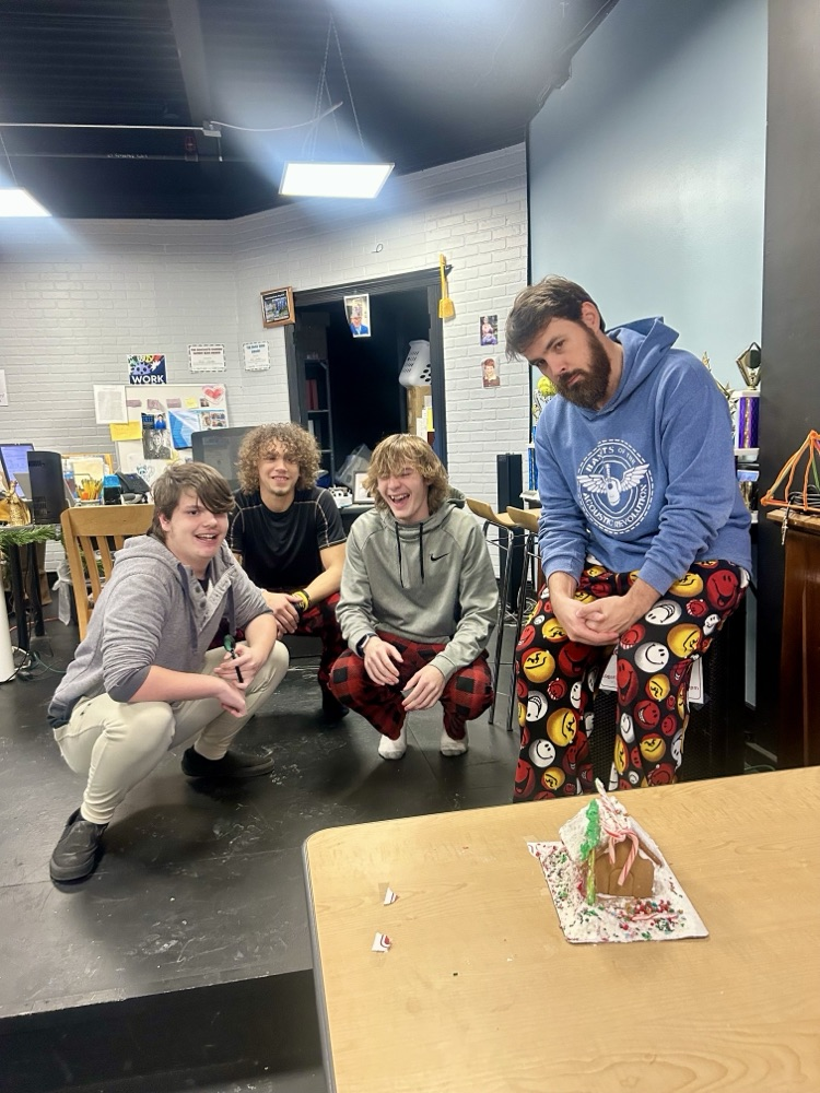 picture of three students and a teacher from RHS