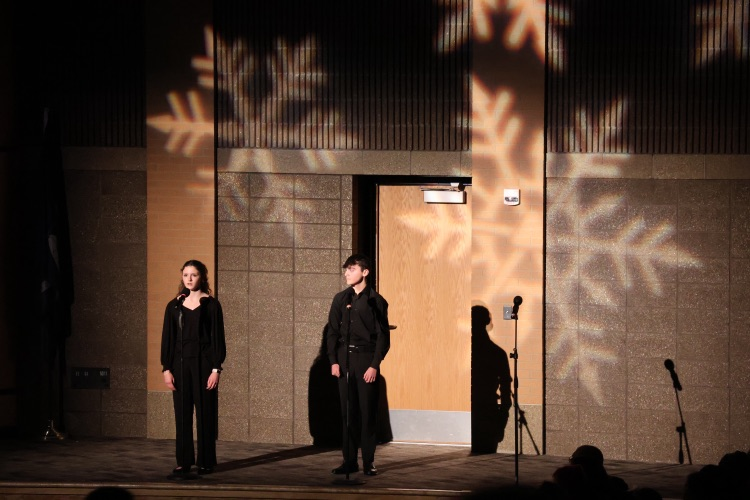 picture of two students performing in the winter musicale concert 