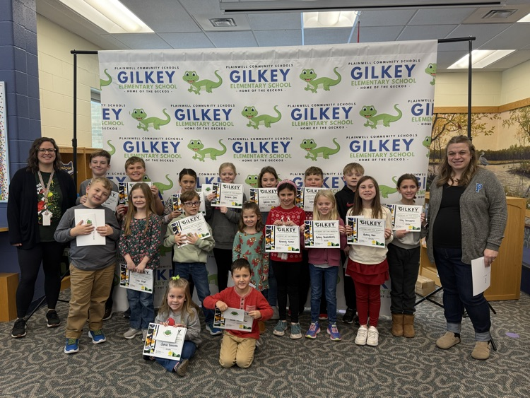 group picture of Gilkey students and staff of the month for December 