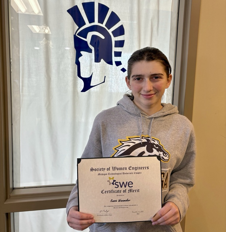 picture of phs student holding an award for science and engineering 