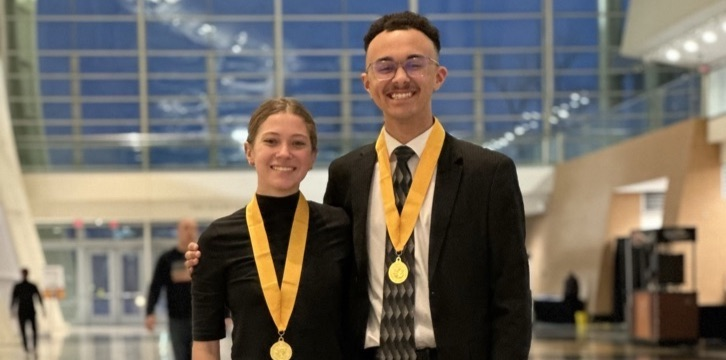 picture of two phs band musicians at all state performance