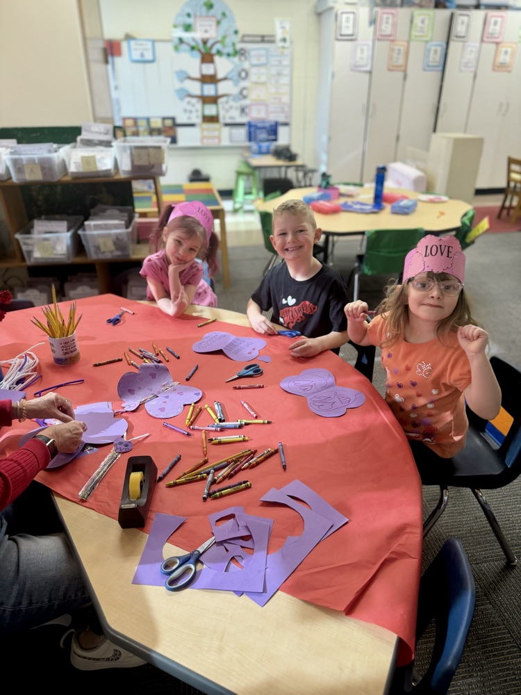 picture of students creating a Valentine craft