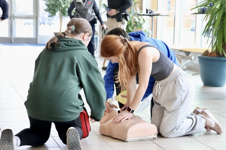 picture of phs first aid students during a simulated medical scenario 
