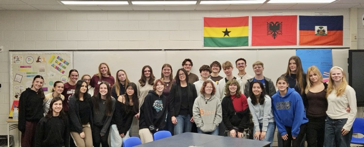phs multicultural club students with a guest presenter for women’s history month