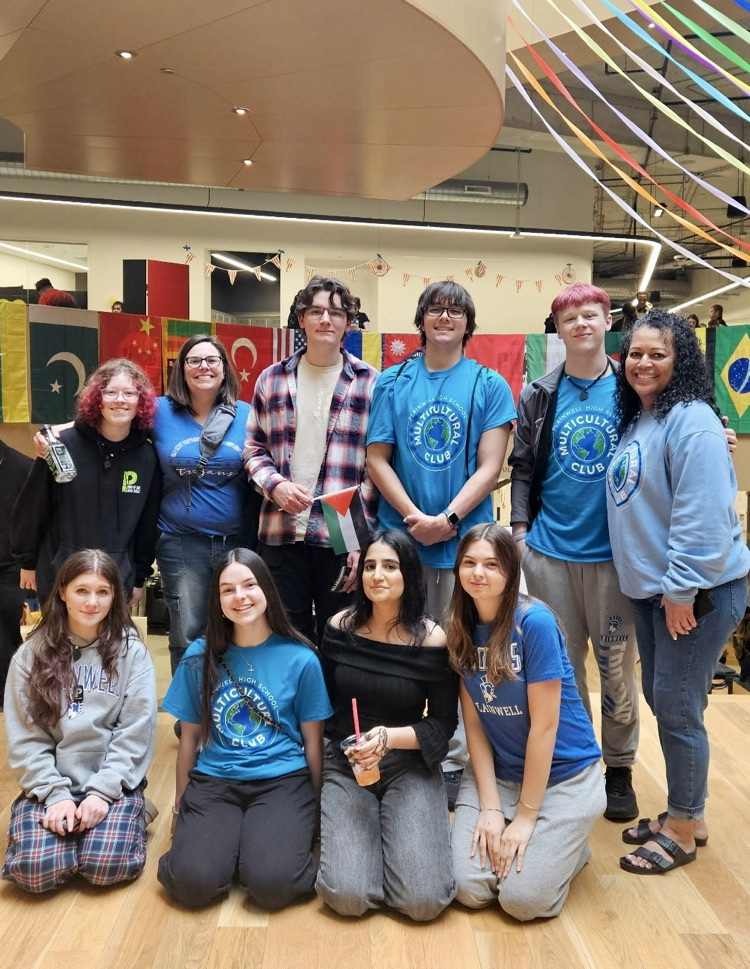 phs multicultural club students posing for a picture at an event 