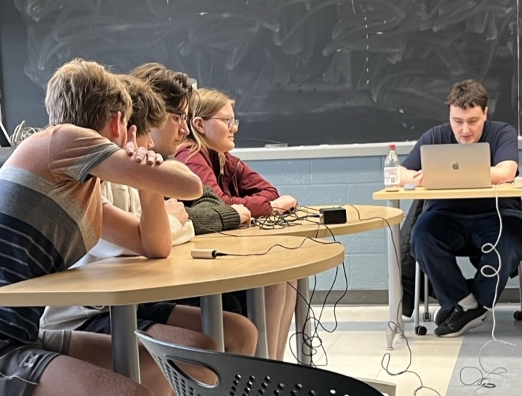 picture of quiz bowl students during a competition   