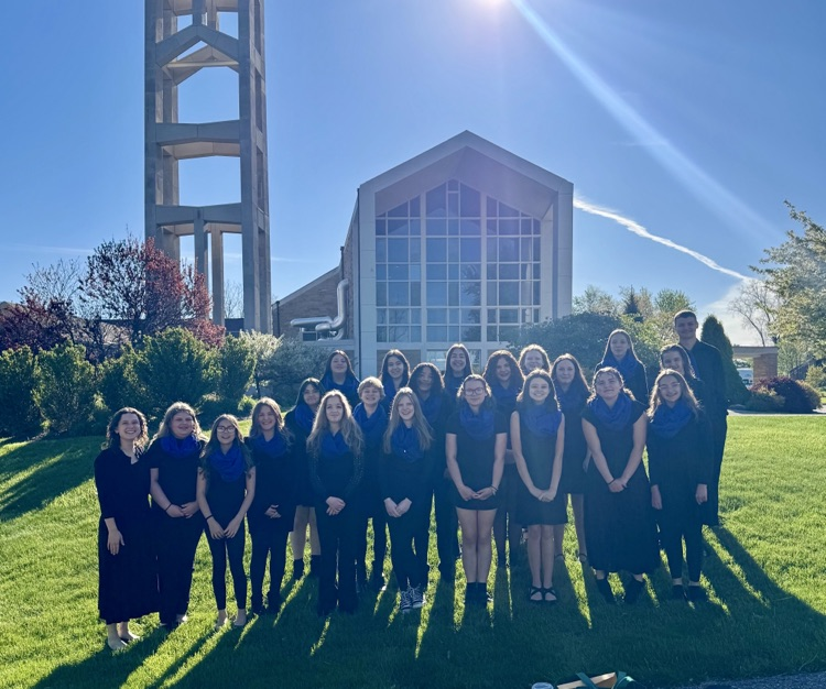 picture of middle school honors choir outside of a venue where they performed in their choral festival 