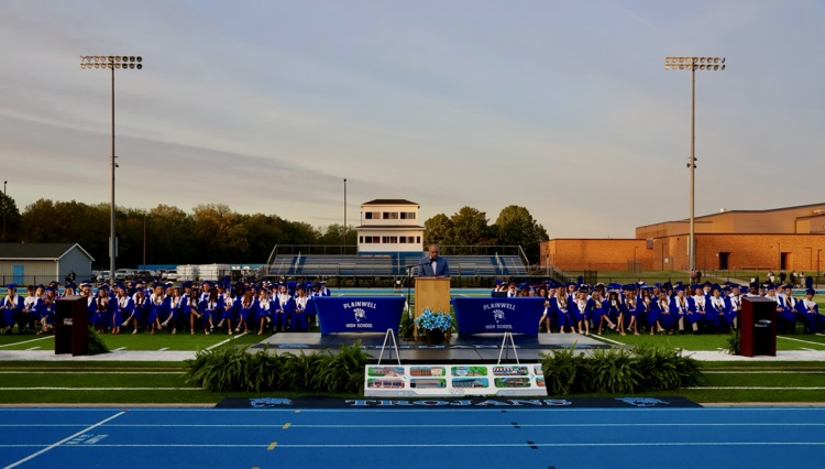 group picture of class of 2026 at their graduation ceremony at Streidl field