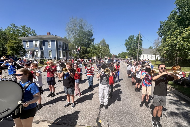 picture of phs and 8th grade bands performing 