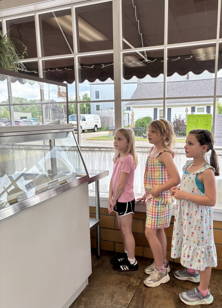 picture of three students waiting in line at plainwell ice cream 