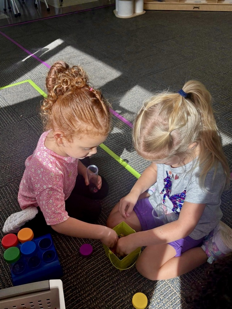 picture of two preschool students playing 