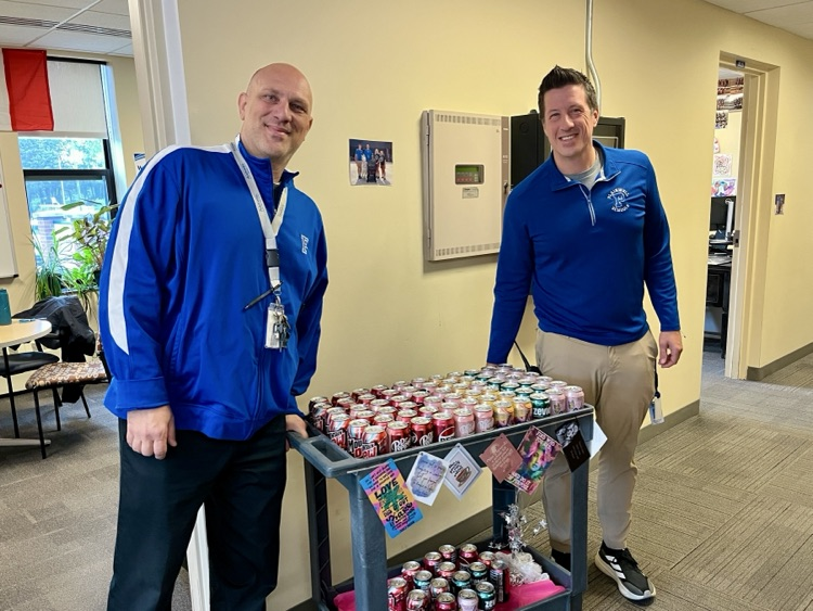 picture of middle school principal manting and assistant principal Hattendorf with a drink cart for the staff