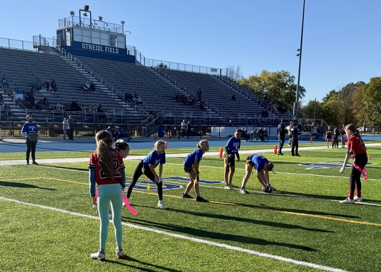 picture of group of girls playing in a flag football game