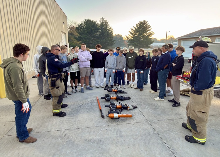 picture of group of phs students working with the local fire department