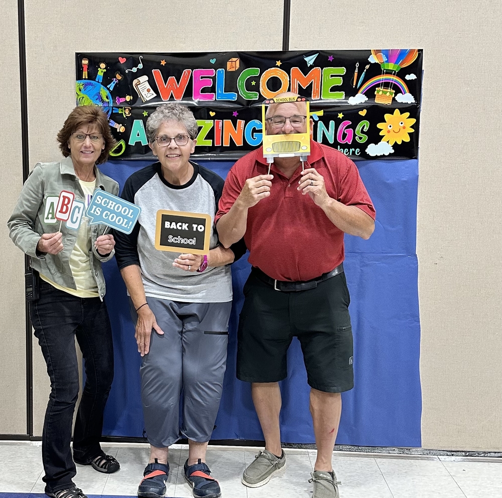 adults taking a photo op