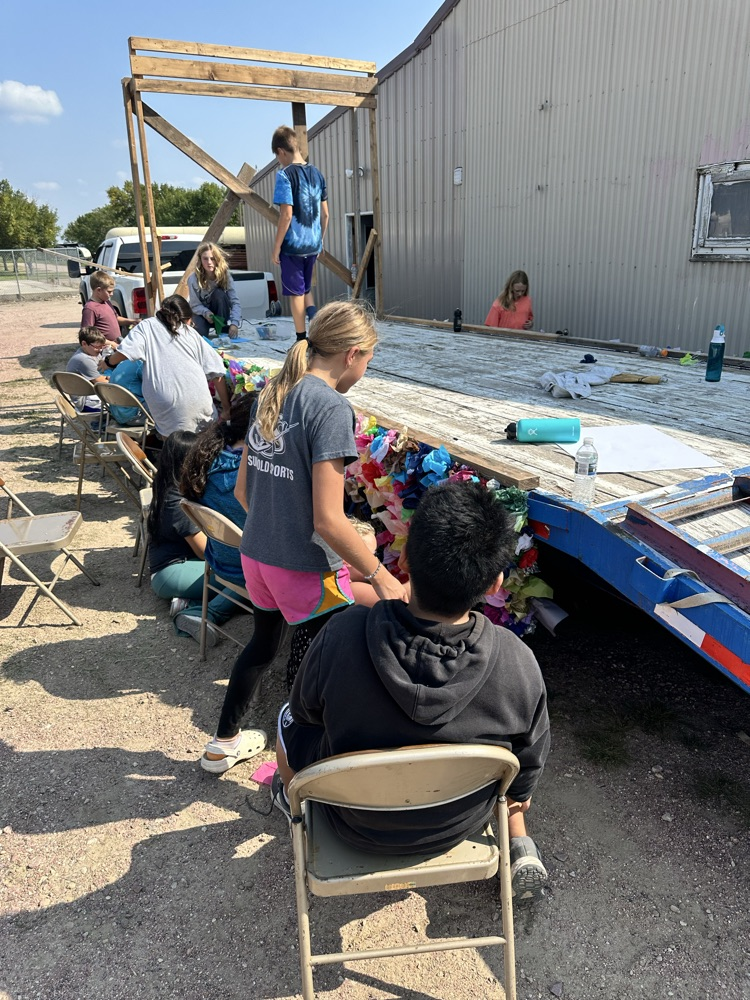 6th grade is working on their float for the parade.