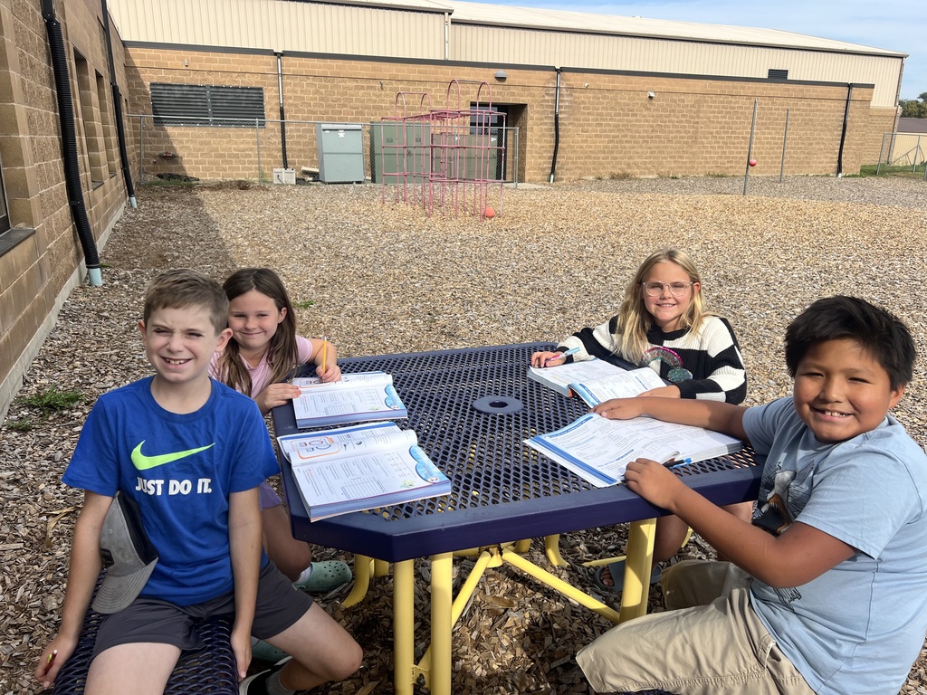 4th graders learning math outside!