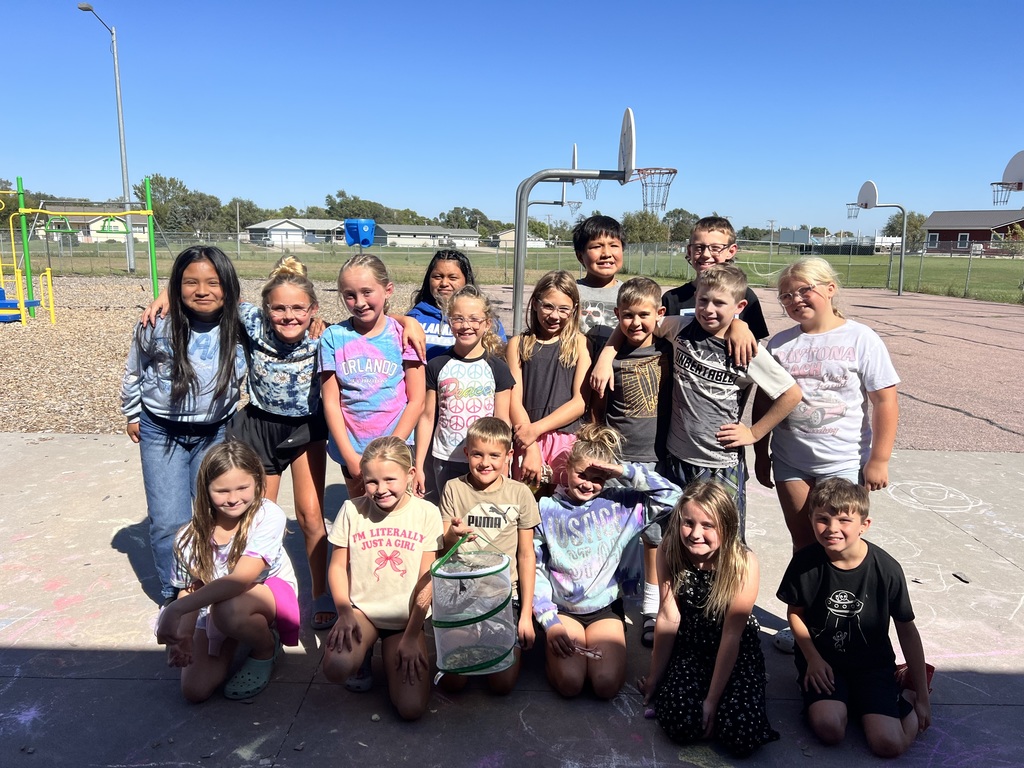 4th graders with their pet butterflies