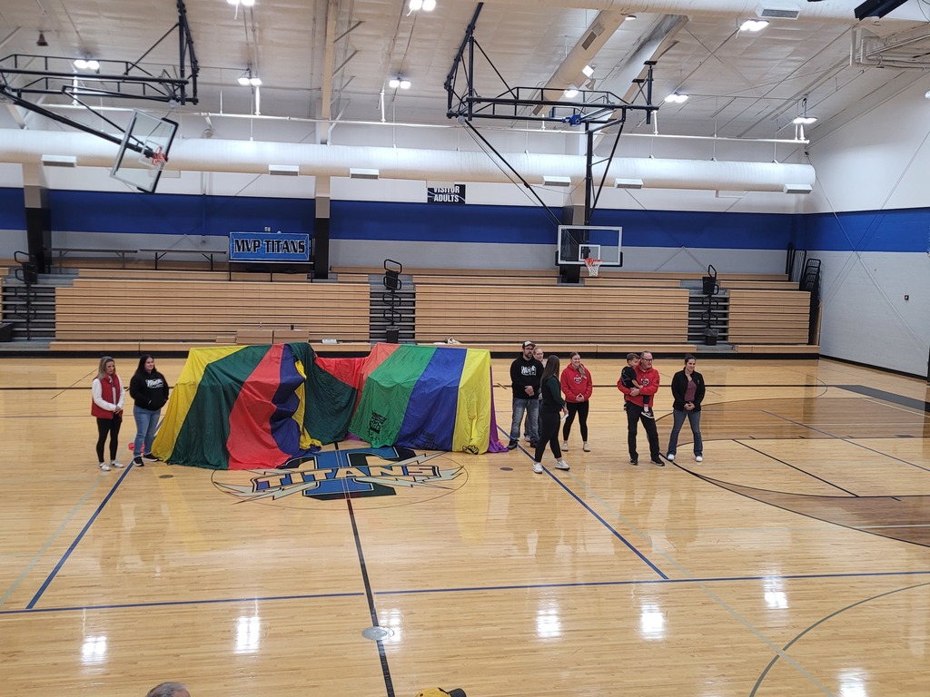 before the reveal, the bike racks are covered with the parachutes