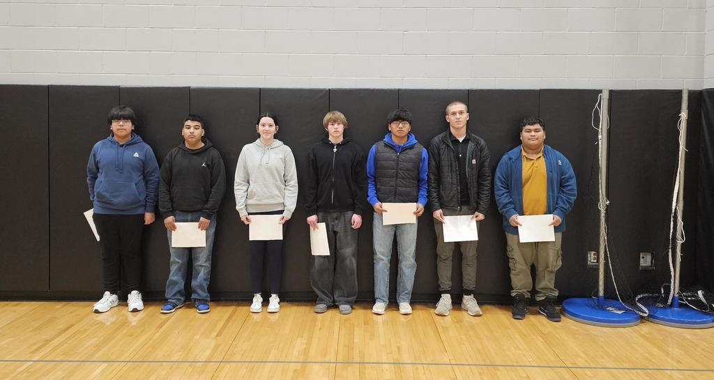 students who were nominated for student of the month wearing different types of clothes