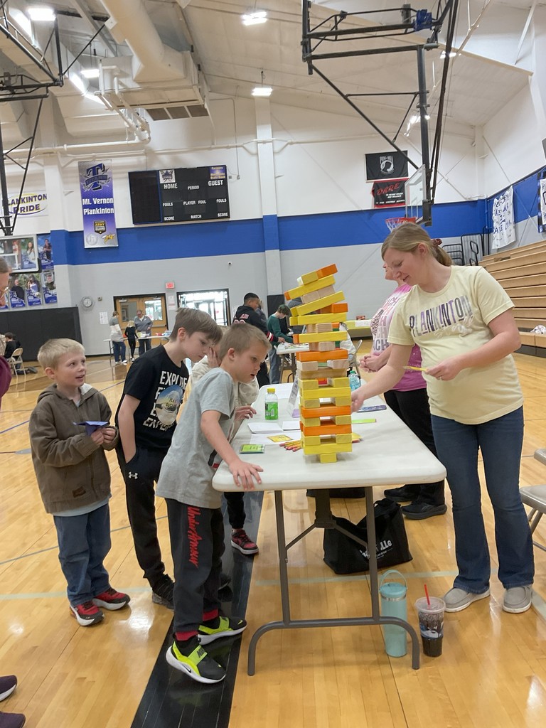  a group of students playing math jenga