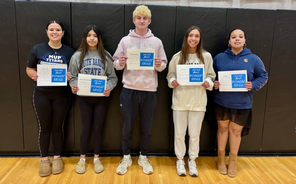 5 high school students displaying their student of the  month nominee certificates