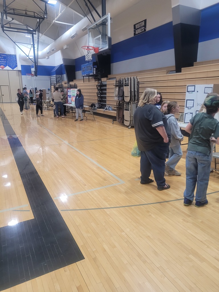 science fair participants in the gym