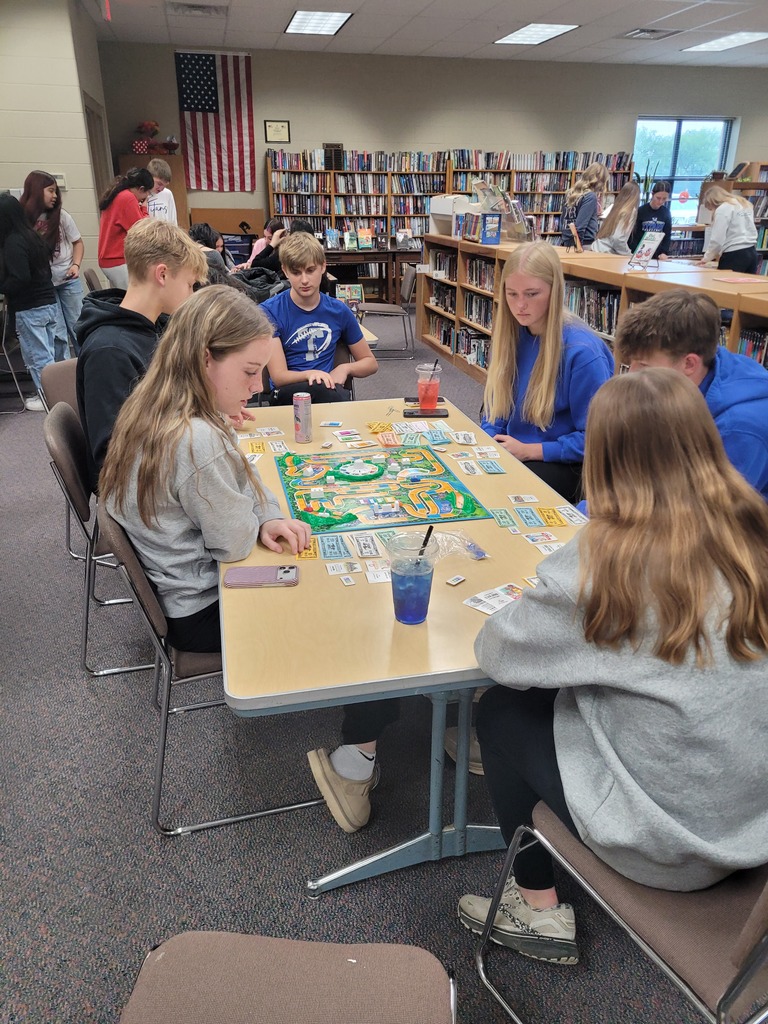 students playing board games in the library