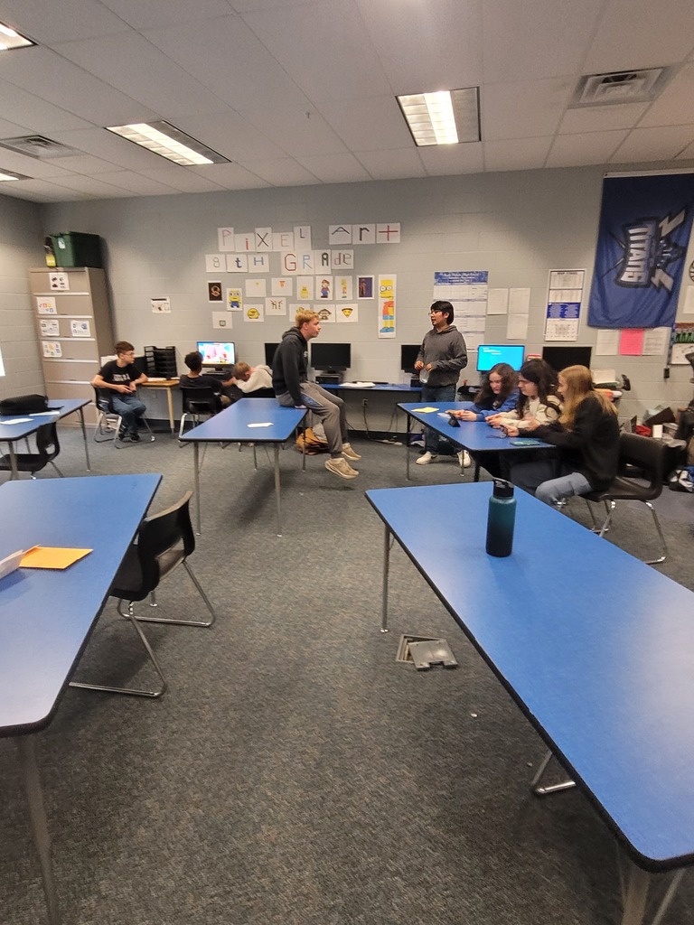 students playing video games in a classroom