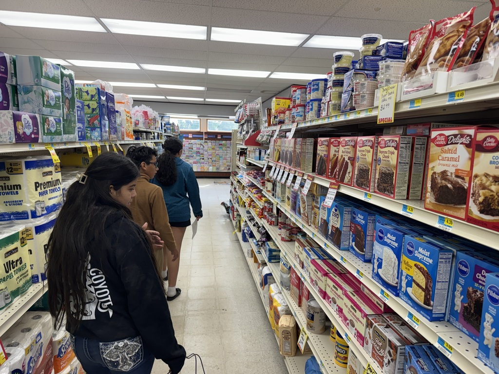 Students looking for their baked goods items.