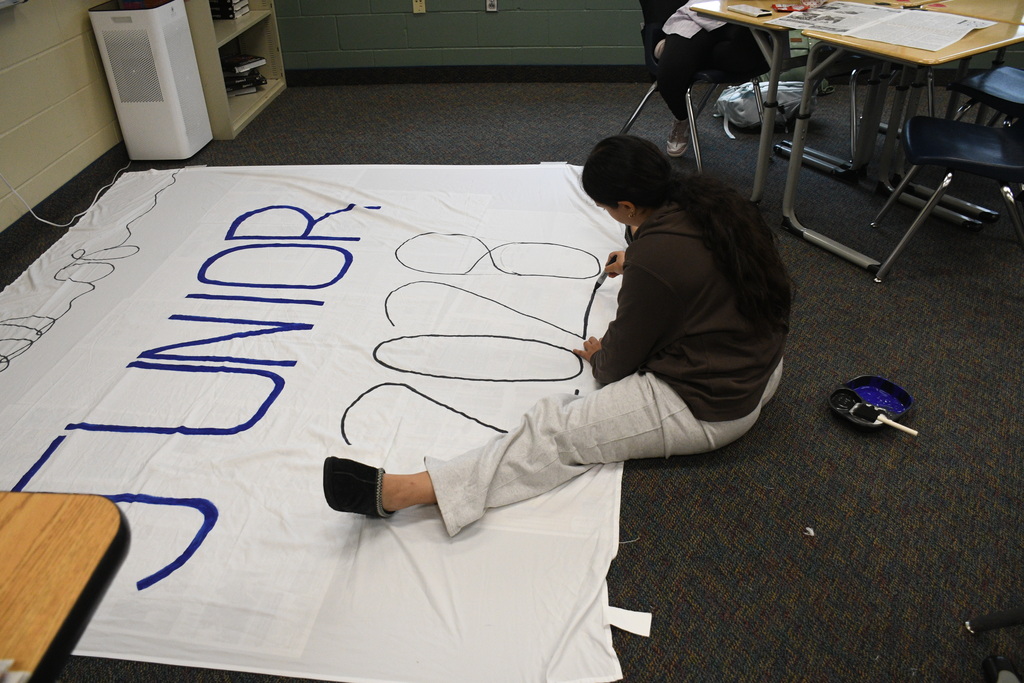 Juniors making the junior posters.