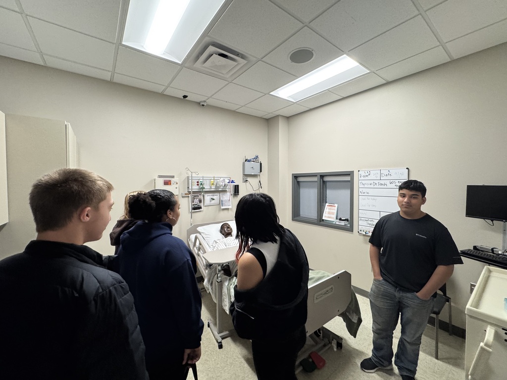 Students looking at the medical rooms