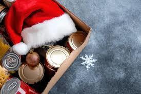 box of canned goods with Santa hat