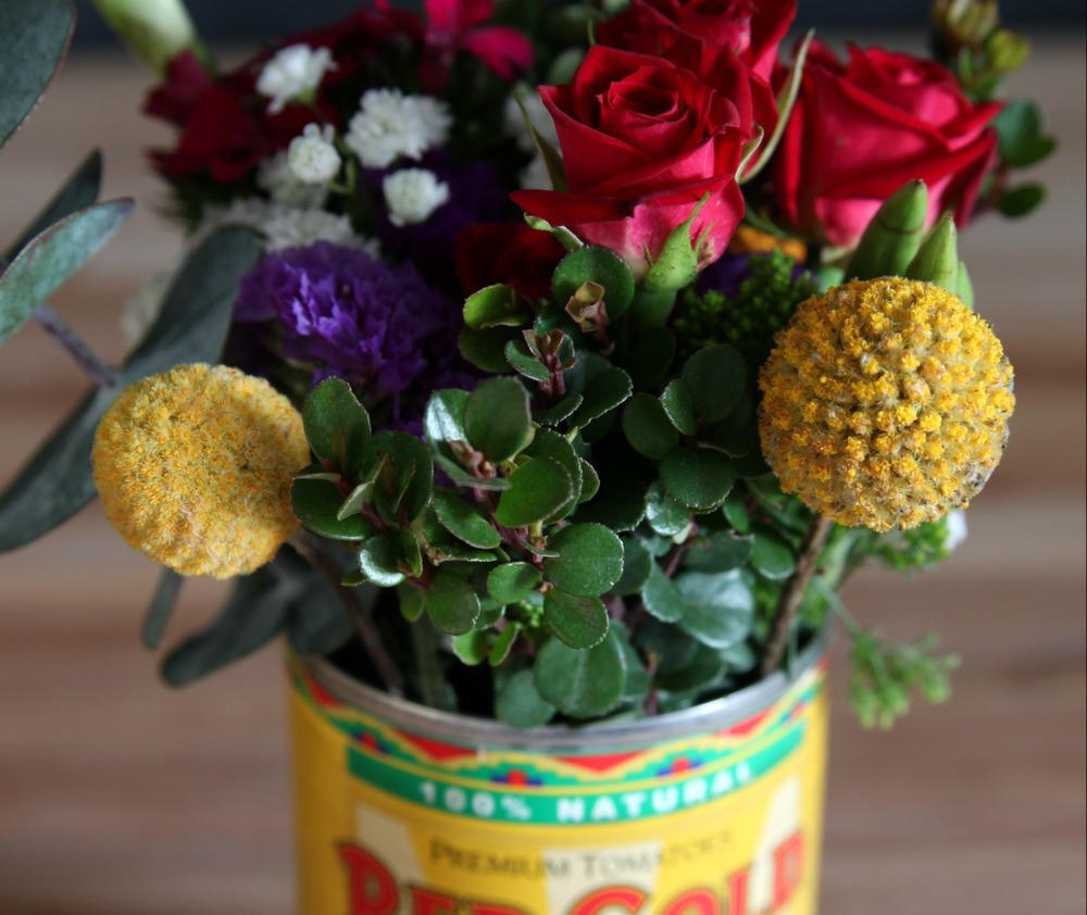 canned goods with flowers