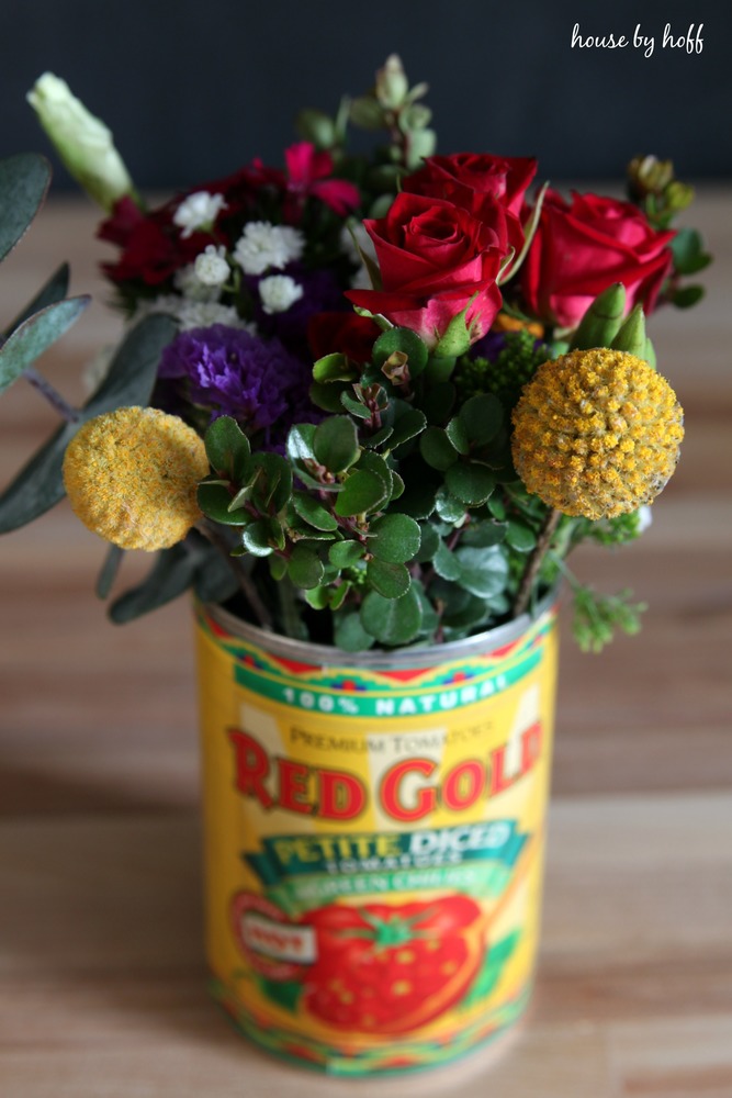 Tin can with flowers
