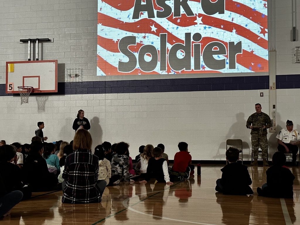 Students listening to local veterans