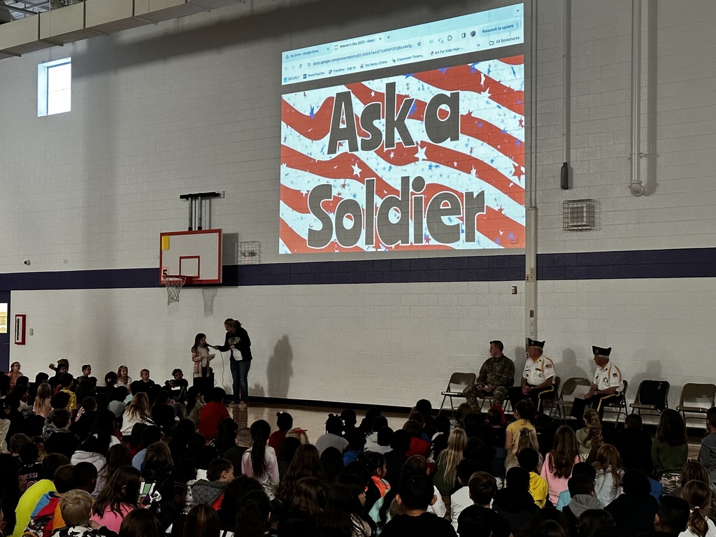 Students listening to local veterans