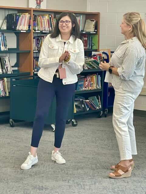 2 teachers in library